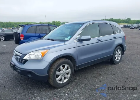 2007 Honda Cr-V Exl z USA, uszkodzony, nr VIN JHLRE487X7C115833